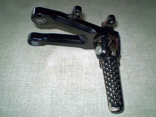 Fireblade CBR 1000 SC 57 Fußraste + Halterung links